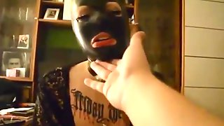 Masked girl gives hand and blowjob