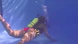 Scuba girls underwater